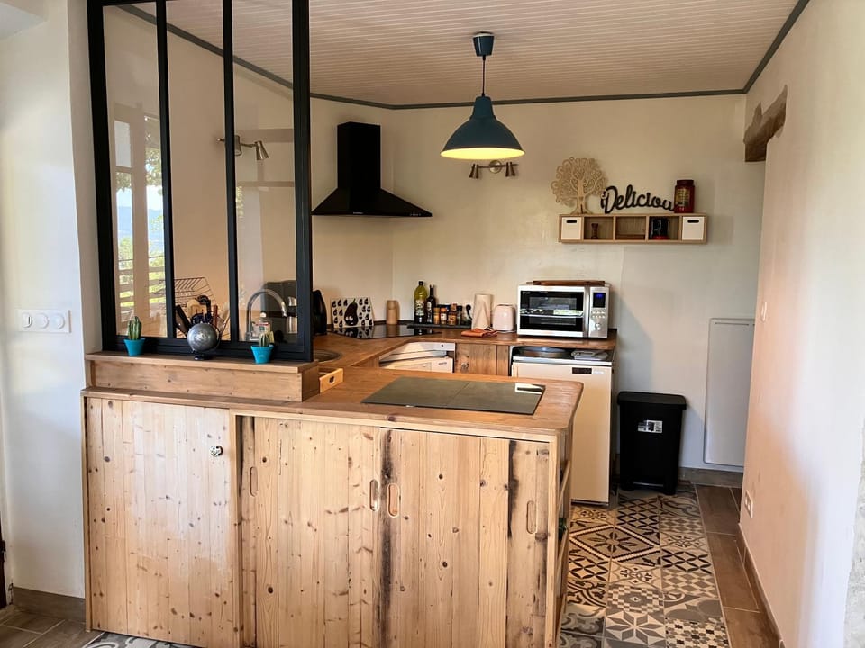 Kitchen or kitchenette, dishwasher, oven, stove, toaster
