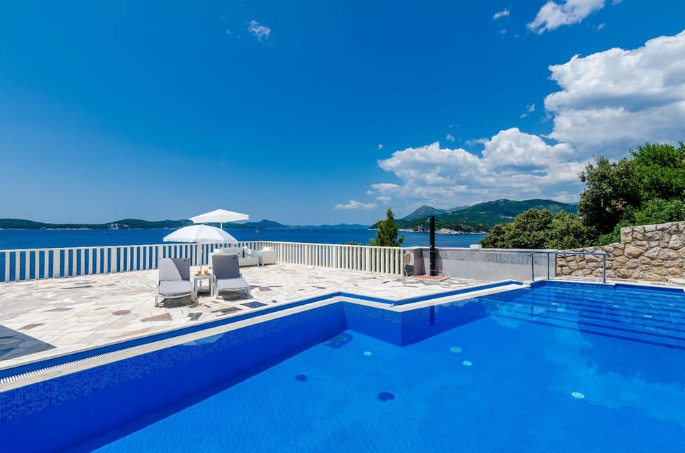 View (from property/room), Balcony/Terrace, Pool view, Sea view, Swimming pool