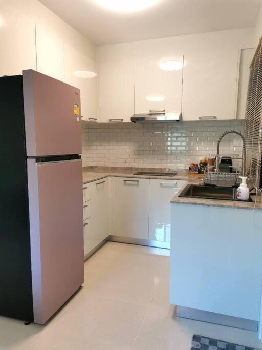 Kitchen or kitchenette, dishwasher, oven, stove