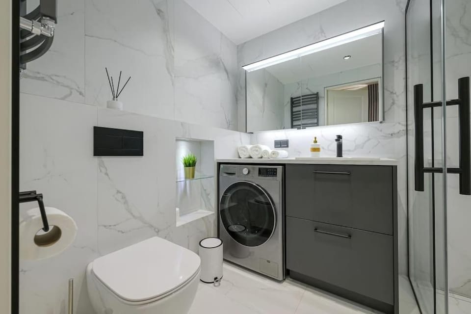 Bathroom, towels, washing machine, dryer