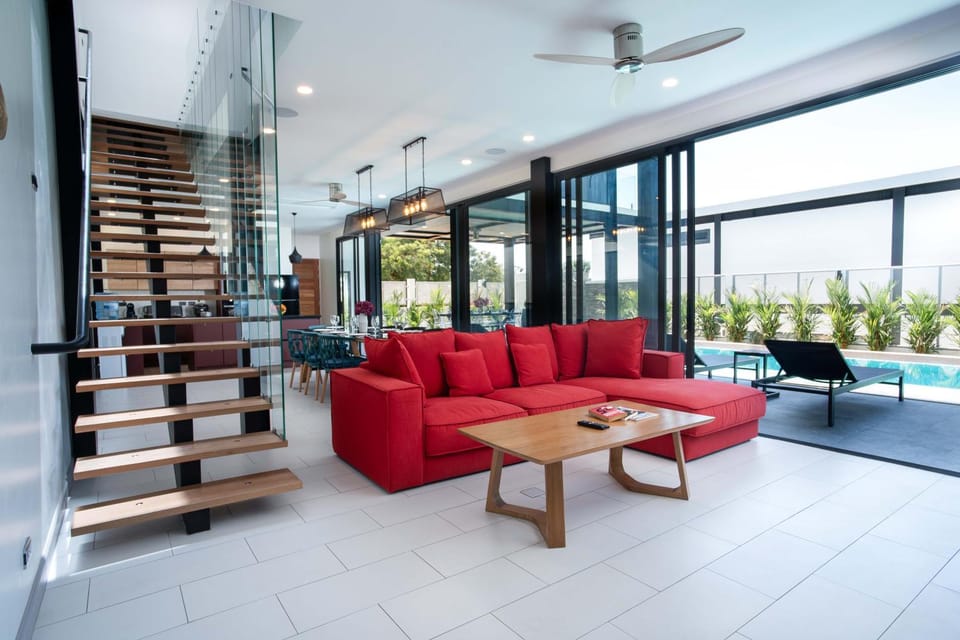 Living room, Seating area, Pool view
