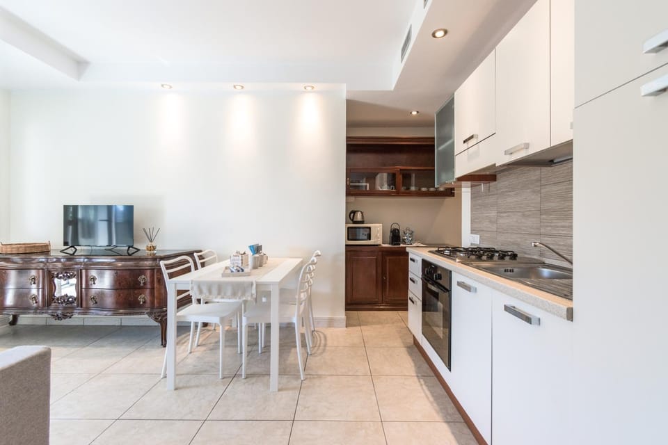 Kitchen or kitchenette, Living room, Seating area, Dining area, dishwasher, oven, stove