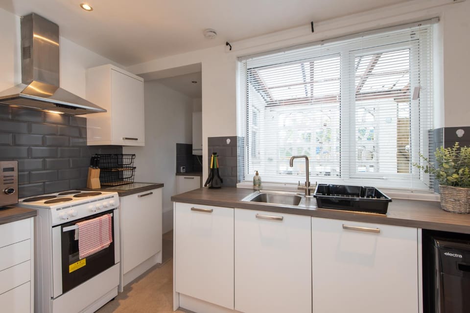 Kitchen or kitchenette, oven, stove, toaster