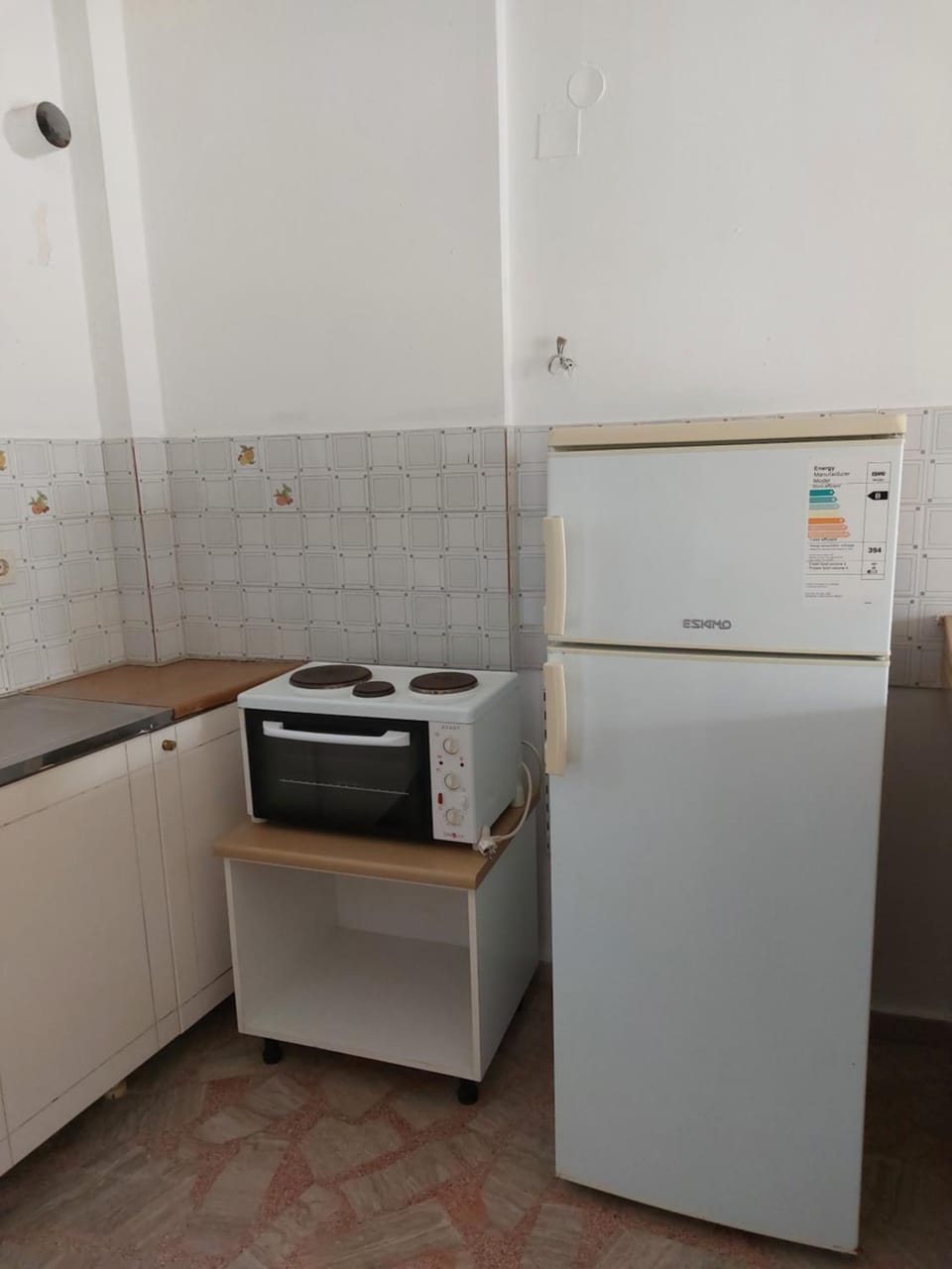Kitchen or kitchenette, oven