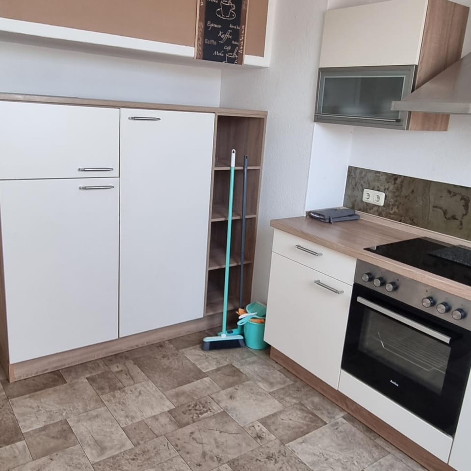 Kitchen or kitchenette, oven, stove