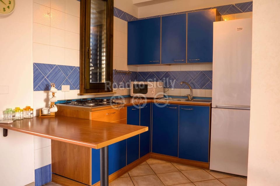 Kitchen or kitchenette, oven, stove