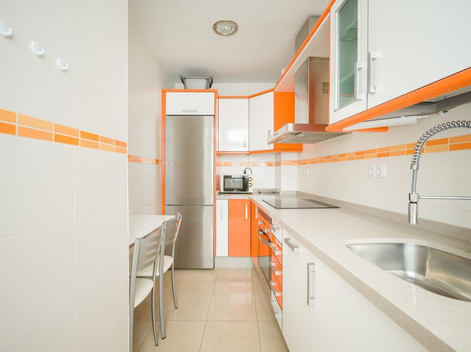 Kitchen or kitchenette, oven
