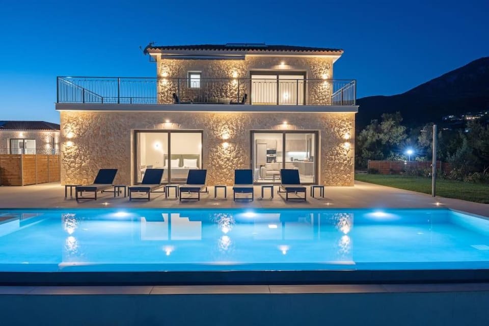Property building, Patio, Night, Pool view, Swimming pool, sunbed