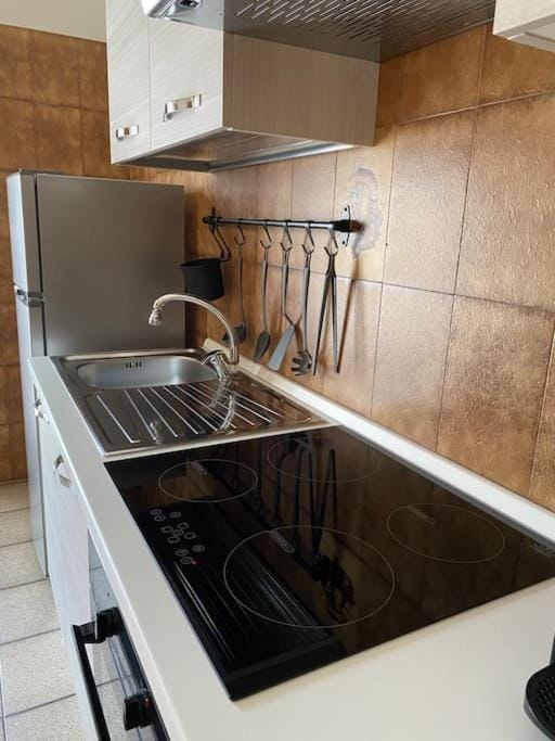 Kitchen or kitchenette, stove