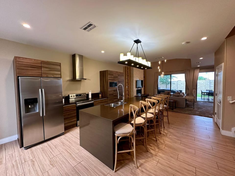 Kitchen or kitchenette, dishwasher, microwave, oven, stove