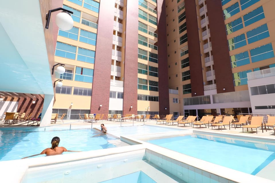 Property building, Communal lounge/ TV room, Day, People, Evening entertainment, Pool view, Swimming pool, Swimming pool, group of guests, sunbed