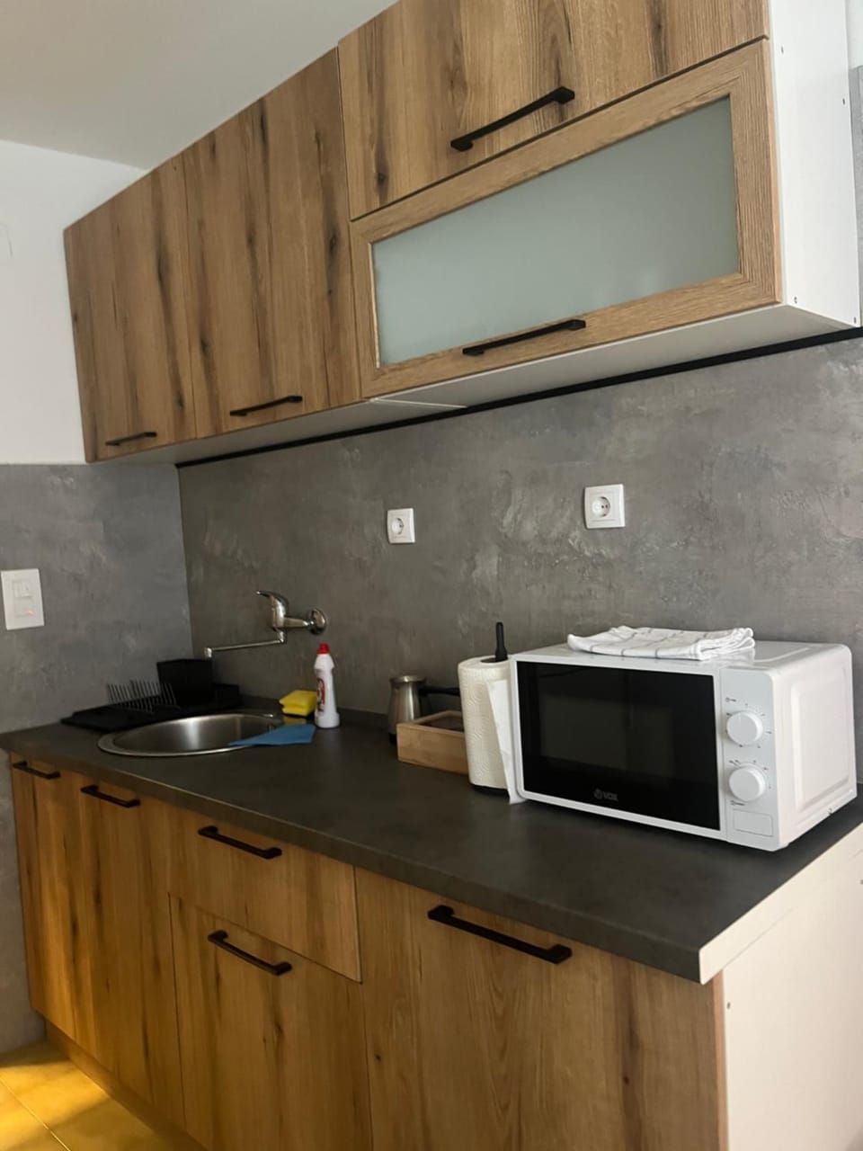 Kitchen or kitchenette, microwave