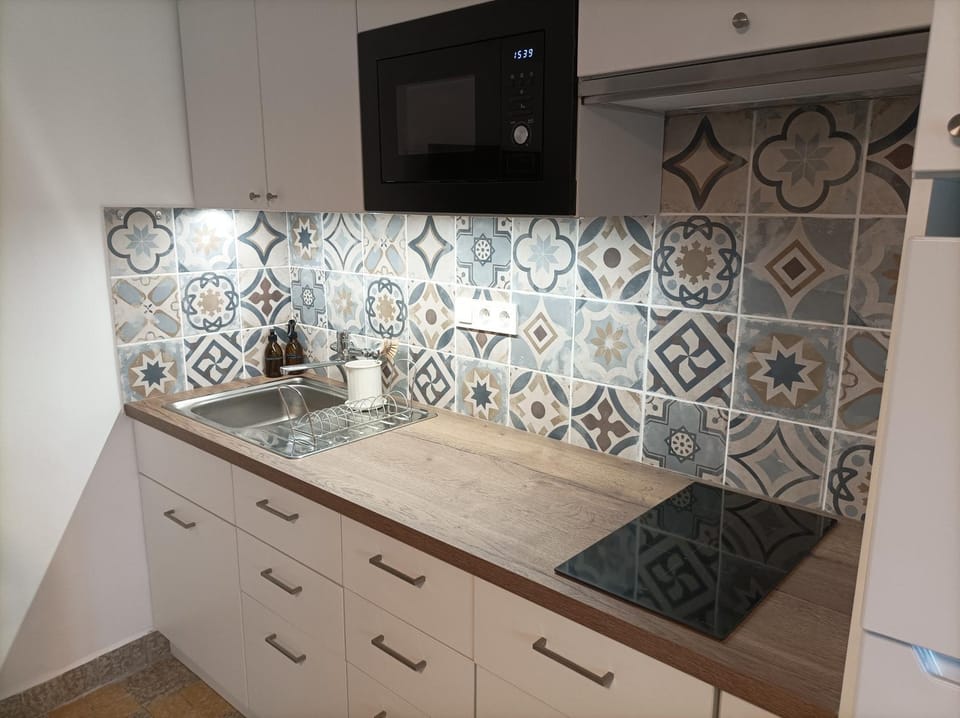 Kitchen or kitchenette, stove