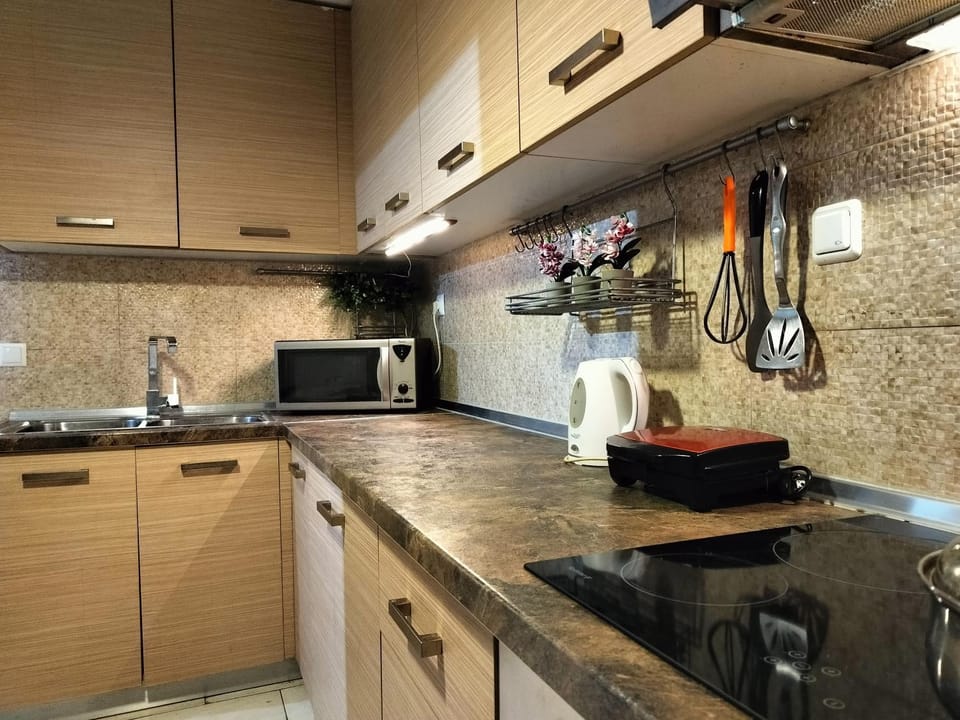 Kitchen or kitchenette, stove