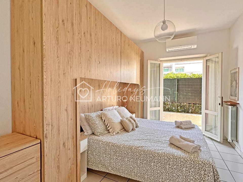 119 - Bilocale al Taunus con portico, giardino e barbecue - SPIAGGIA INCLUSA Apartment in Marche