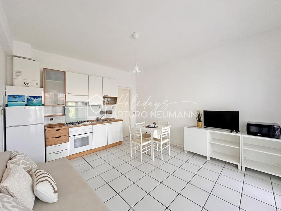 119 - Bilocale al Taunus con portico, giardino e barbecue - SPIAGGIA INCLUSA Apartment in Marche