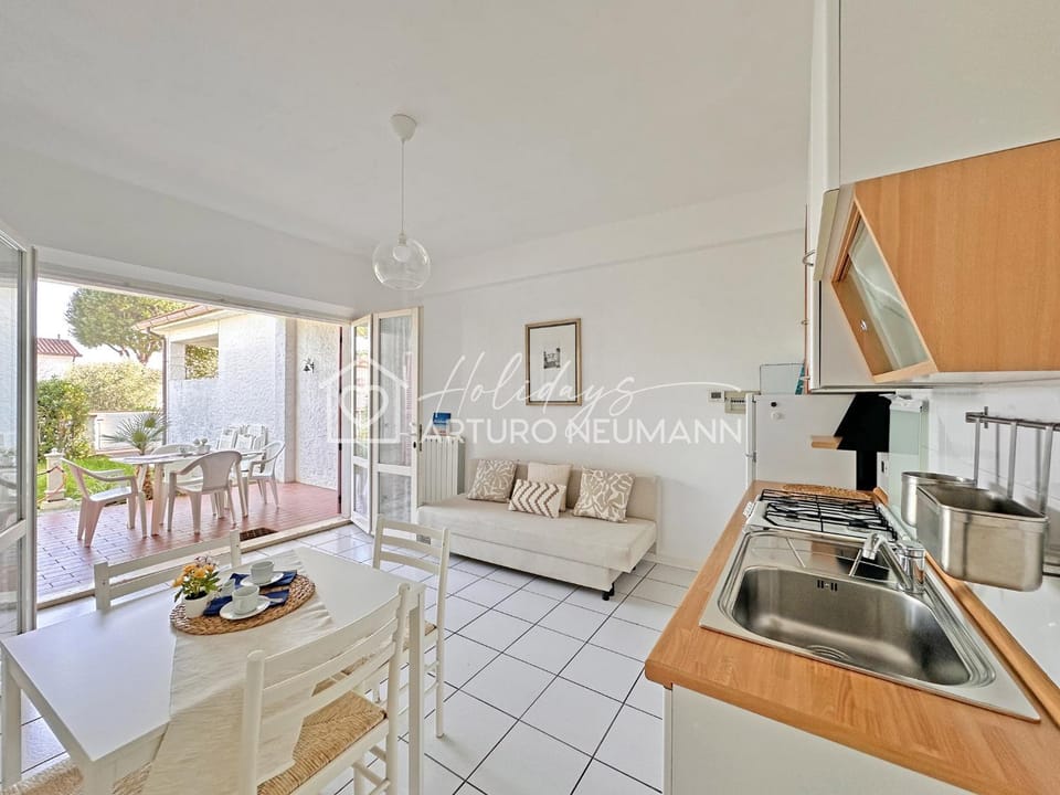 119 - Bilocale al Taunus con portico, giardino e barbecue - SPIAGGIA INCLUSA Apartment in Marche