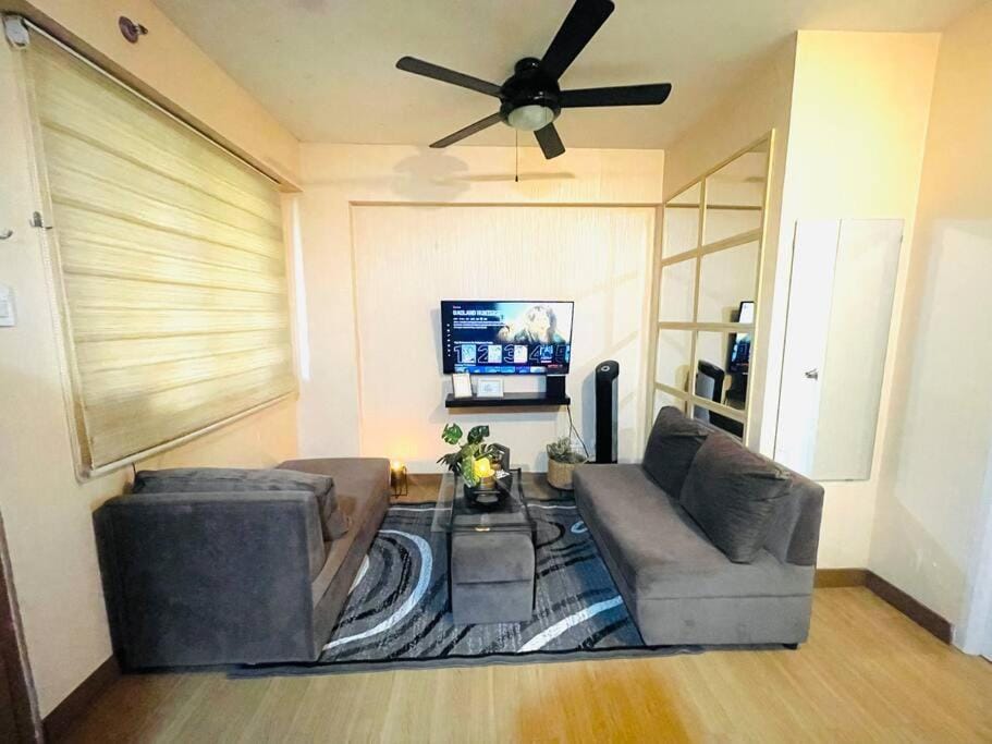 Stylish 1 BR near BGC+airport!Netflix+Dsny+50mbps Apartment in Pasig