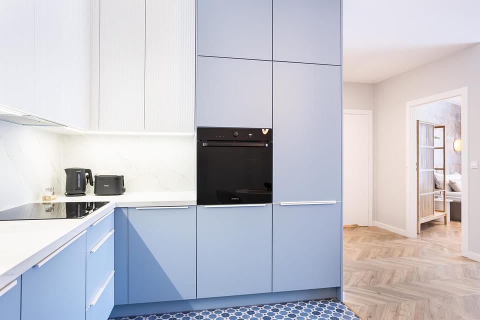 Kitchen or kitchenette, dishwasher, oven, stove, toaster