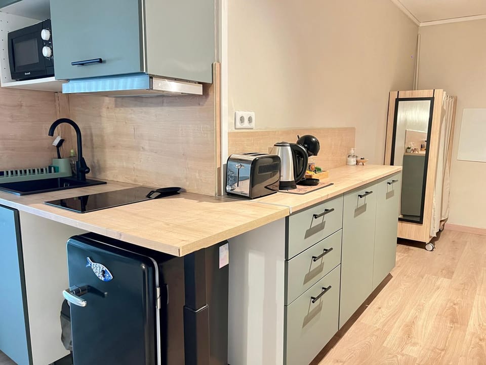 Kitchen or kitchenette, stove