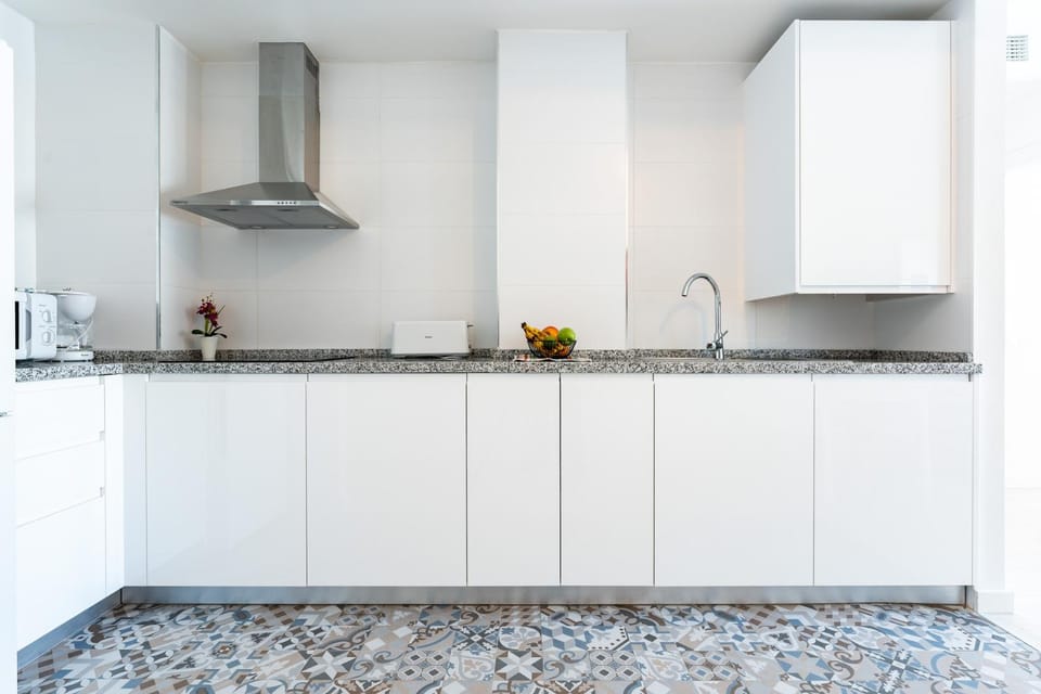 Kitchen or kitchenette, microwave, stove, toaster