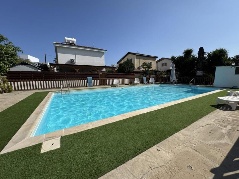 Swimming pool, sunbed