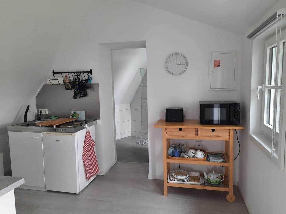 Kitchen or kitchenette, stove, toaster