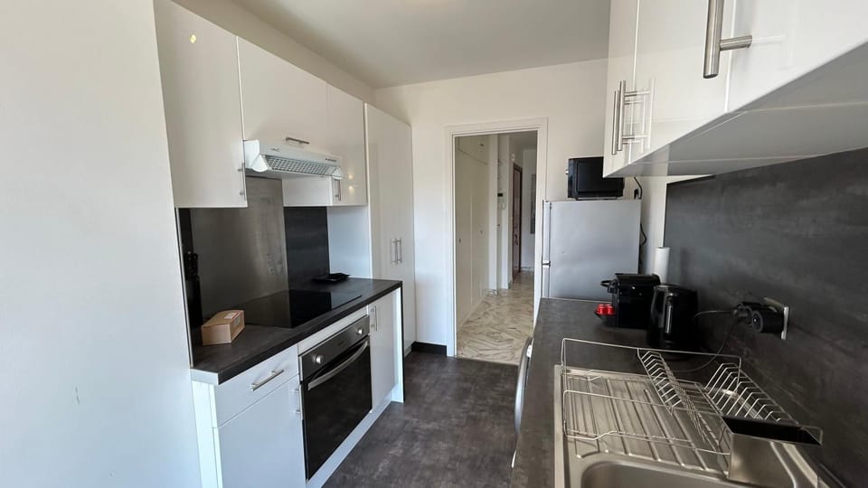 Kitchen or kitchenette, oven, stove, toaster