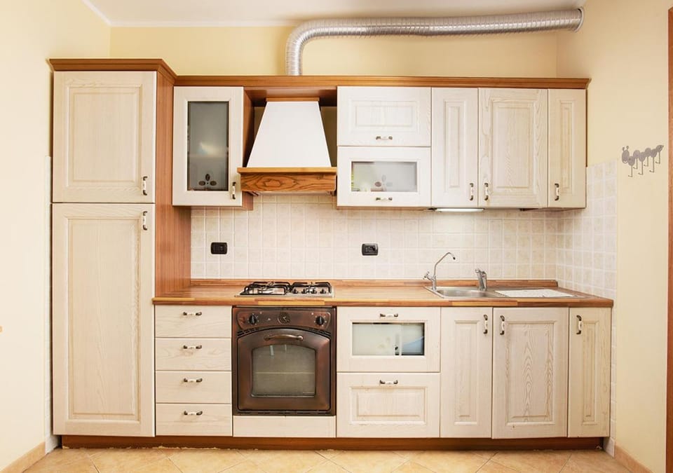 Kitchen or kitchenette, oven, stove