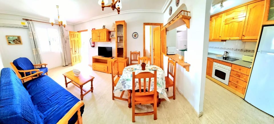 TV and multimedia, Kitchen or kitchenette, Living room, Seating area, Dining area, oven, stove, air conditioner