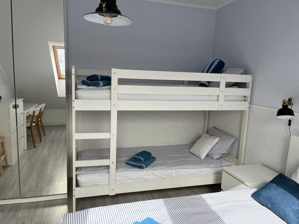 Bed, Photo of the whole room, Bedroom, bunk bed, towels, wardrobe