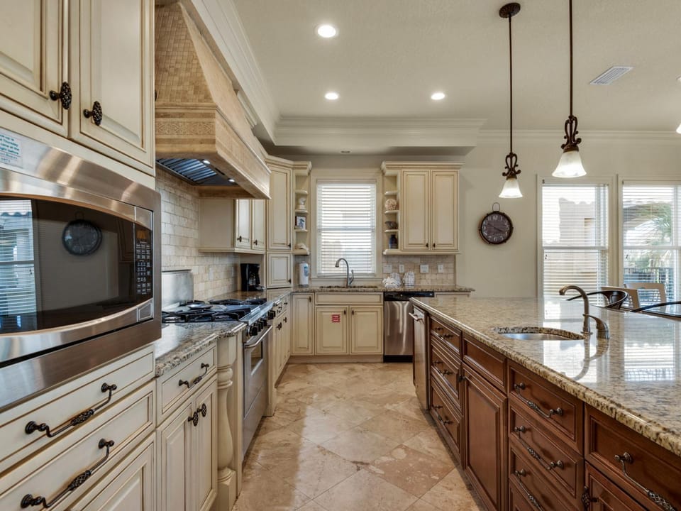 Kitchen or kitchenette, dishwasher, oven, stove, toaster