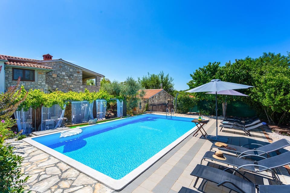 Property building, Patio, Pool view, Swimming pool, sunbed