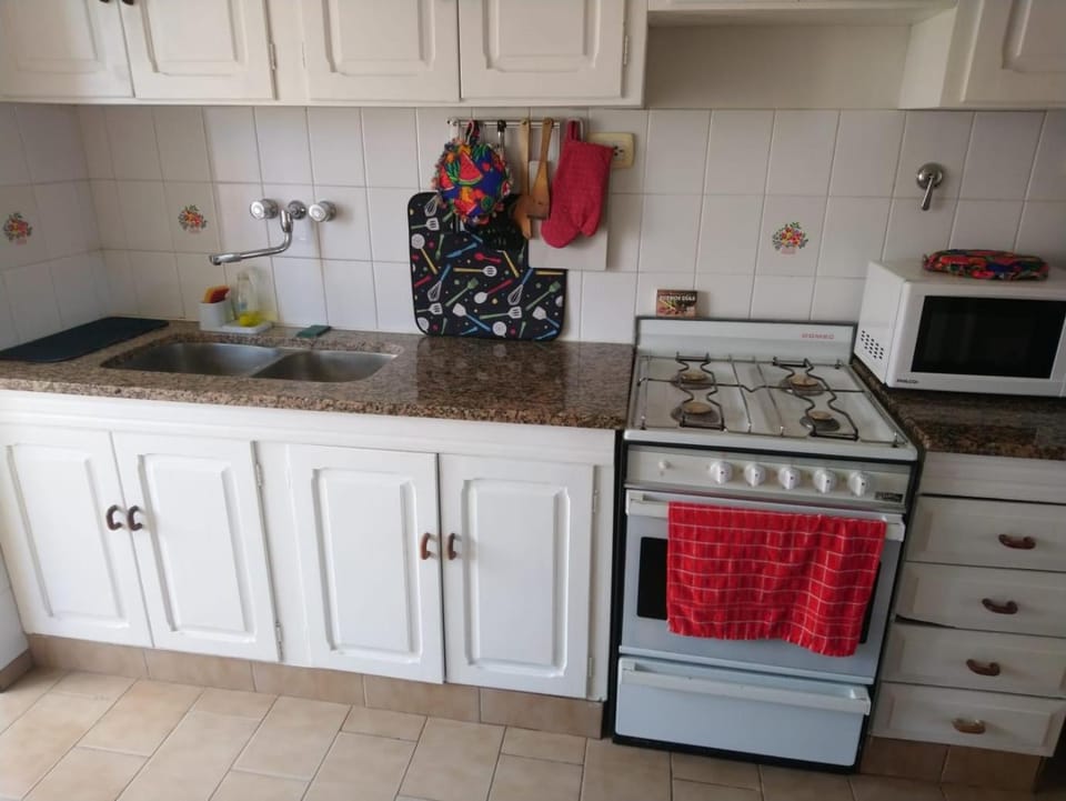 Kitchen or kitchenette, microwave, oven