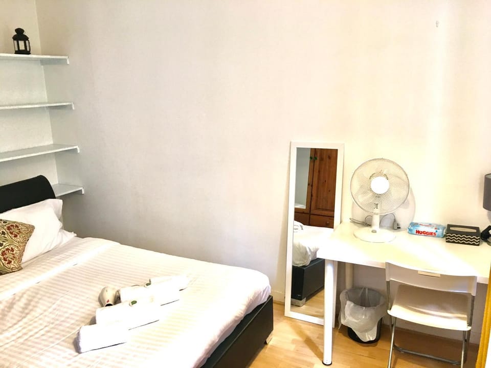 Bed, Photo of the whole room, Bedroom, hair dryier, towels
