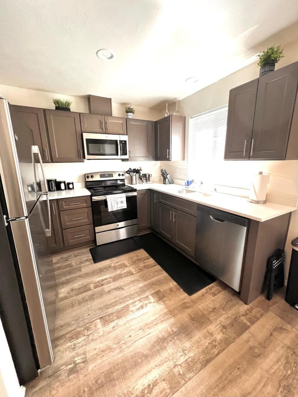 Kitchen or kitchenette, dishwasher, oven, stove, toaster