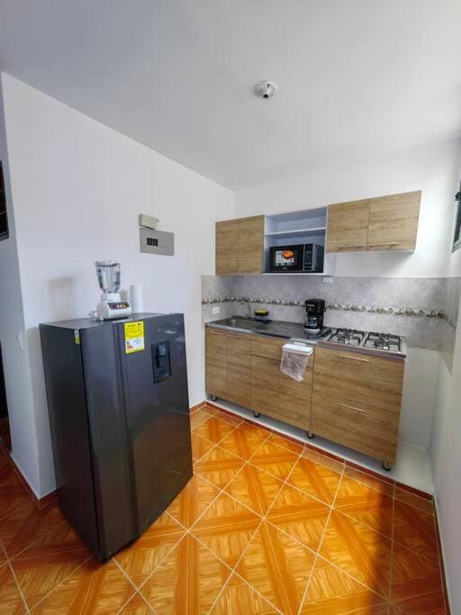 Kitchen or kitchenette, oven