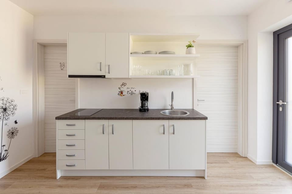 Kitchen or kitchenette, stove