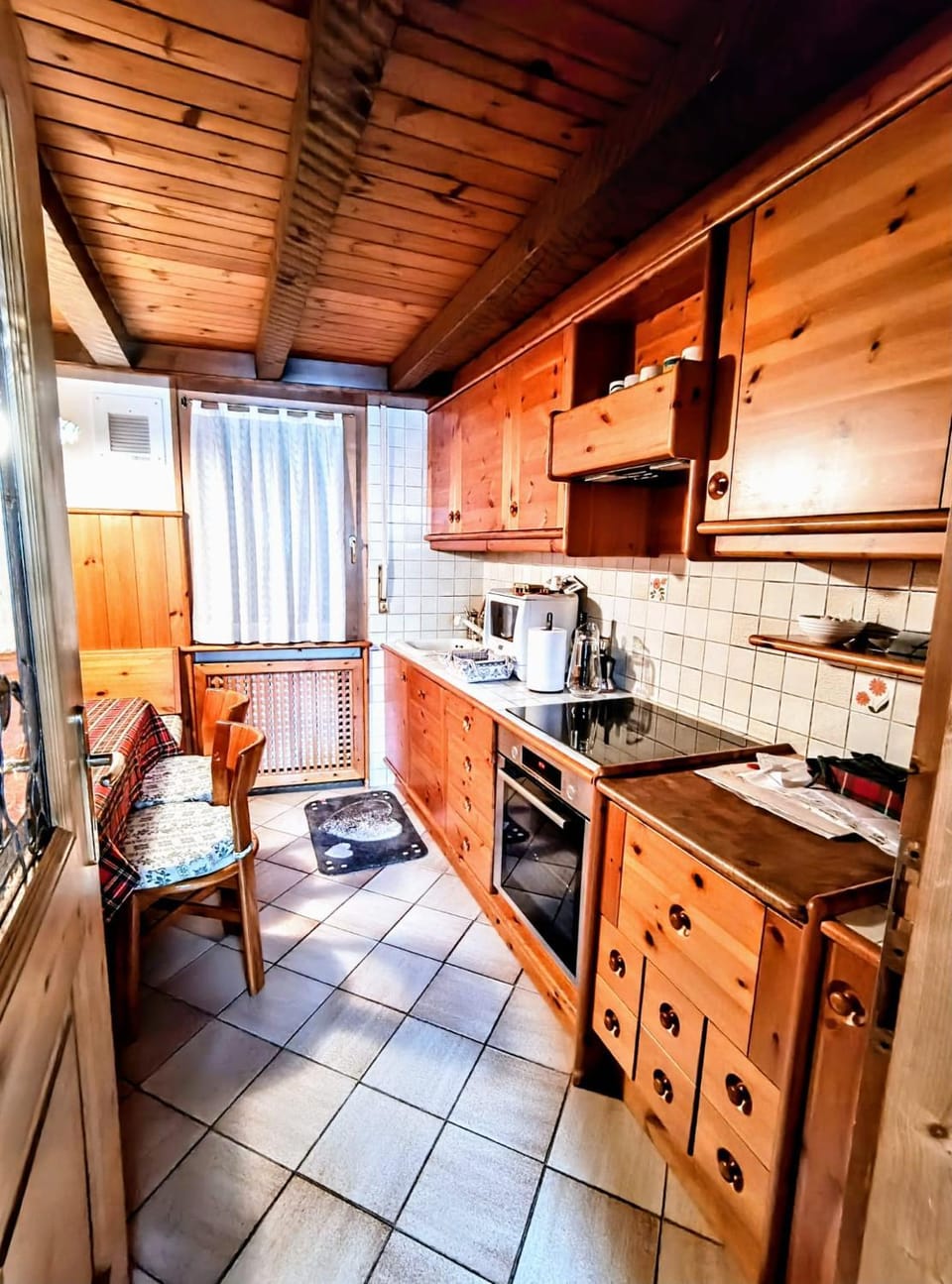 Kitchen or kitchenette, dishwasher, oven, stove