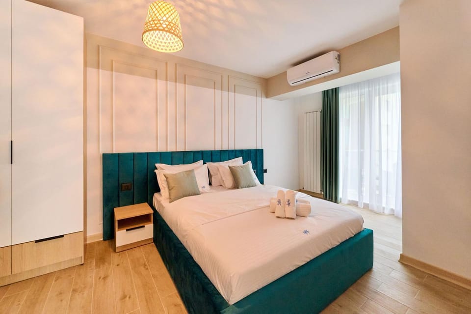 Bed, Photo of the whole room, Bedroom, towels, air conditioner