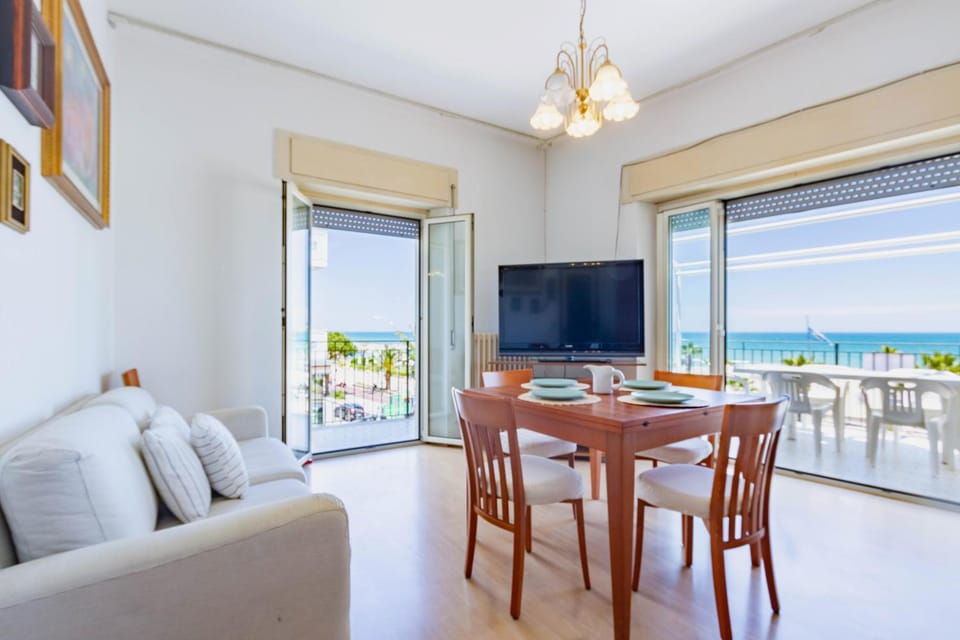 View (from property/room), Balcony/Terrace, Living room, Dining area, Beach, Sea view