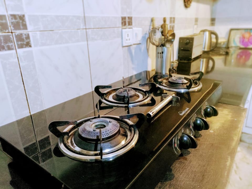 Kitchen or kitchenette, stove