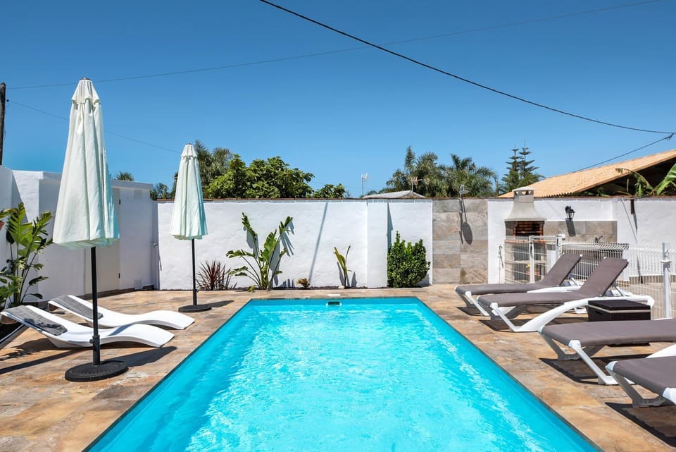 Property building, Living room, Swimming pool