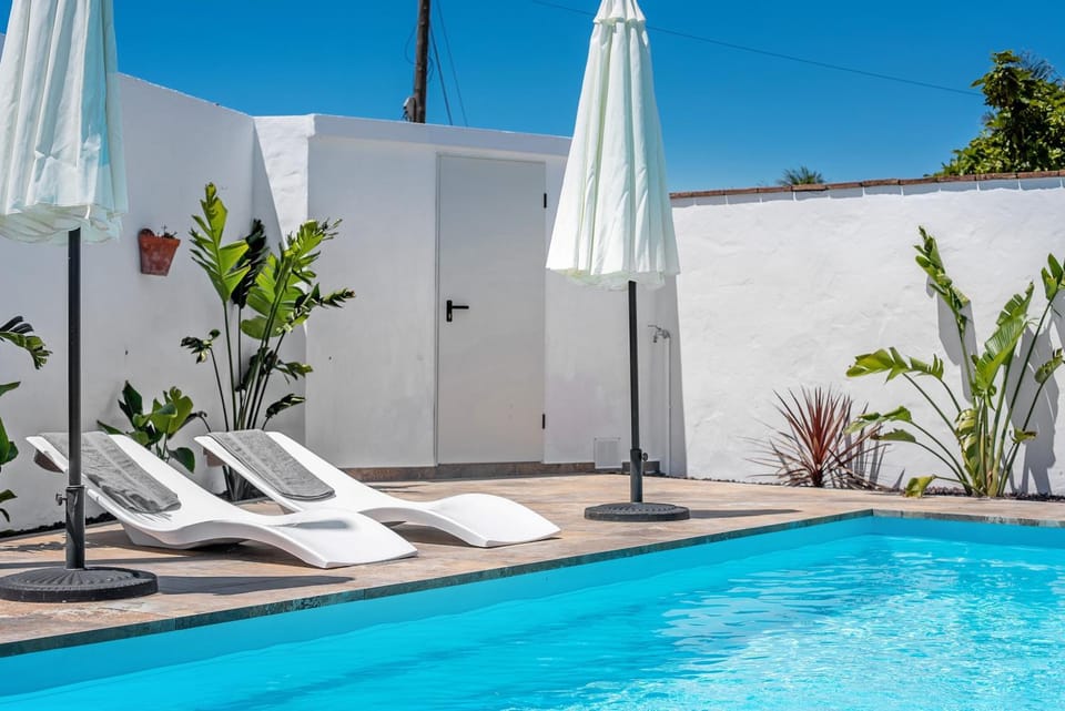 Property building, Living room, Swimming pool