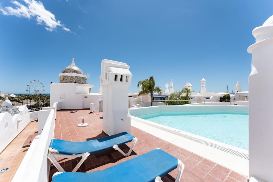 Property building, Living room, Swimming pool