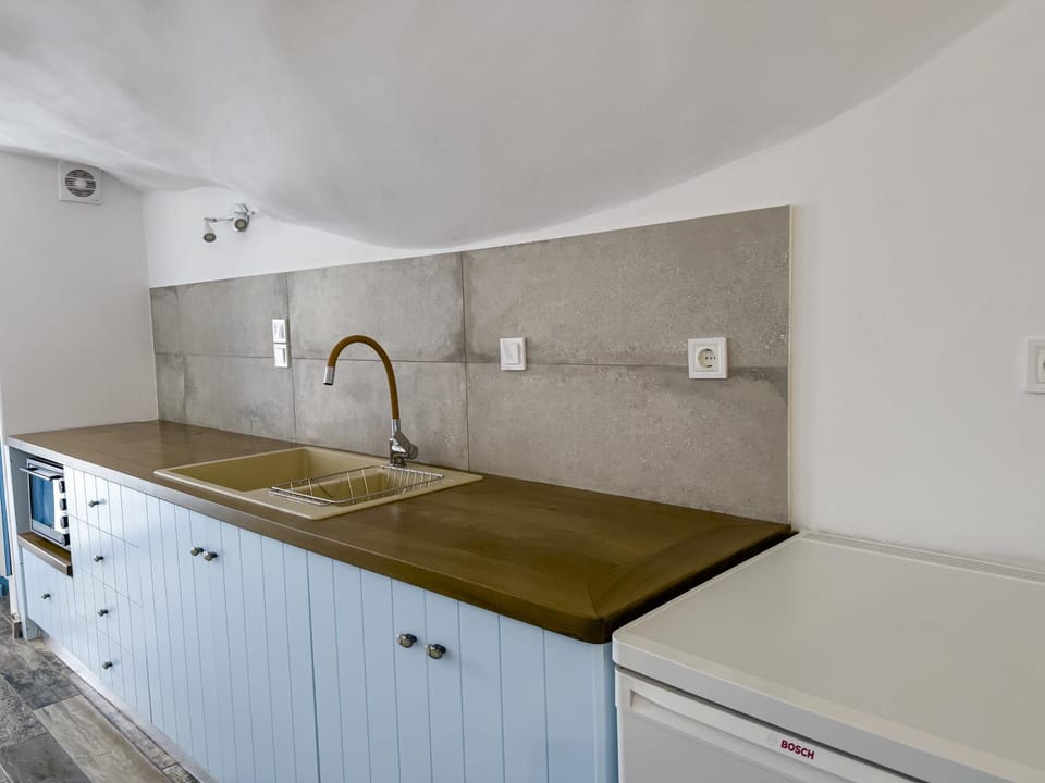 Kitchen or kitchenette, stove