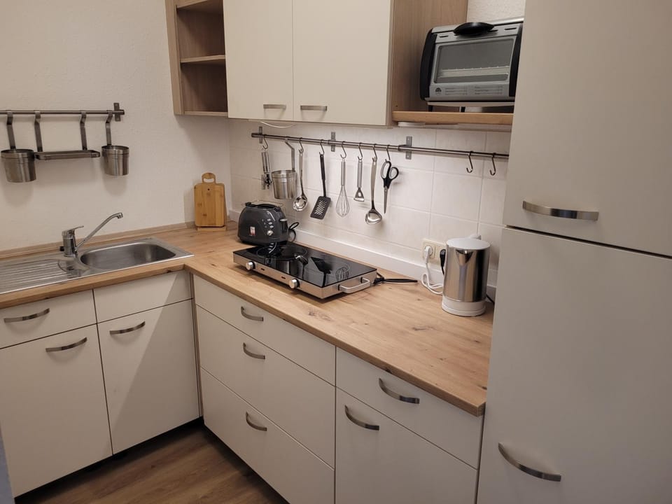 Kitchen or kitchenette, stove
