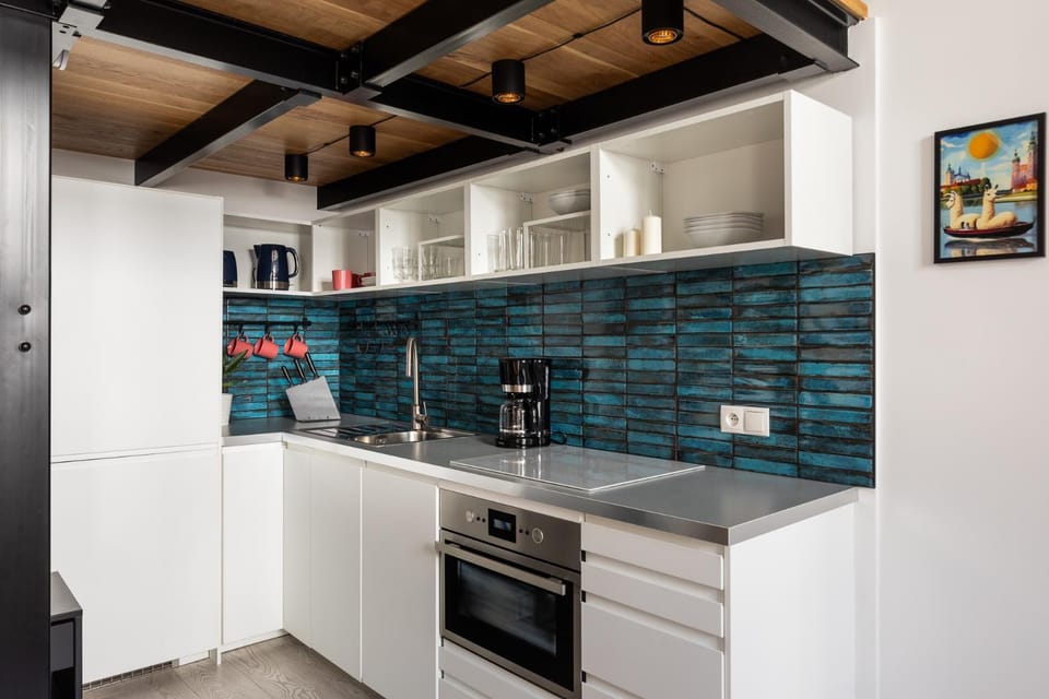 Kitchen or kitchenette, dishwasher, oven, toaster