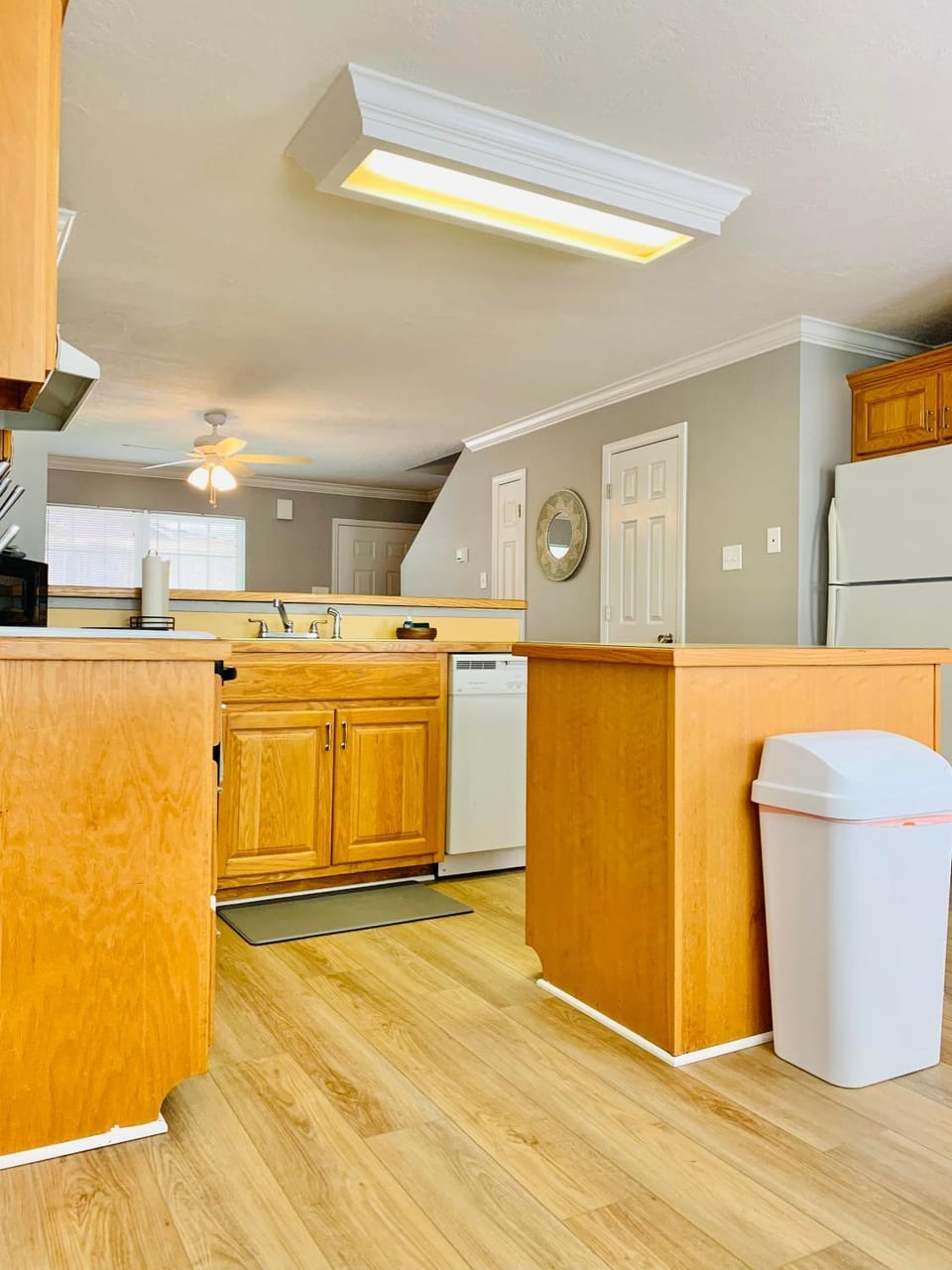 Kitchen or kitchenette, dishwasher, oven, stove