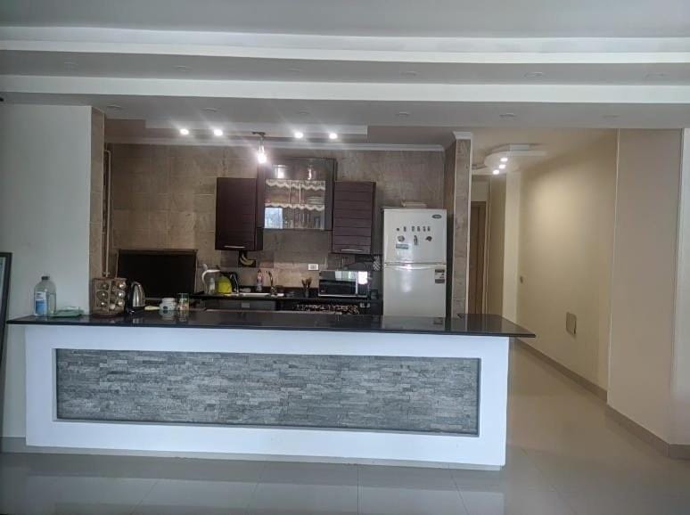 Kitchen or kitchenette, oven